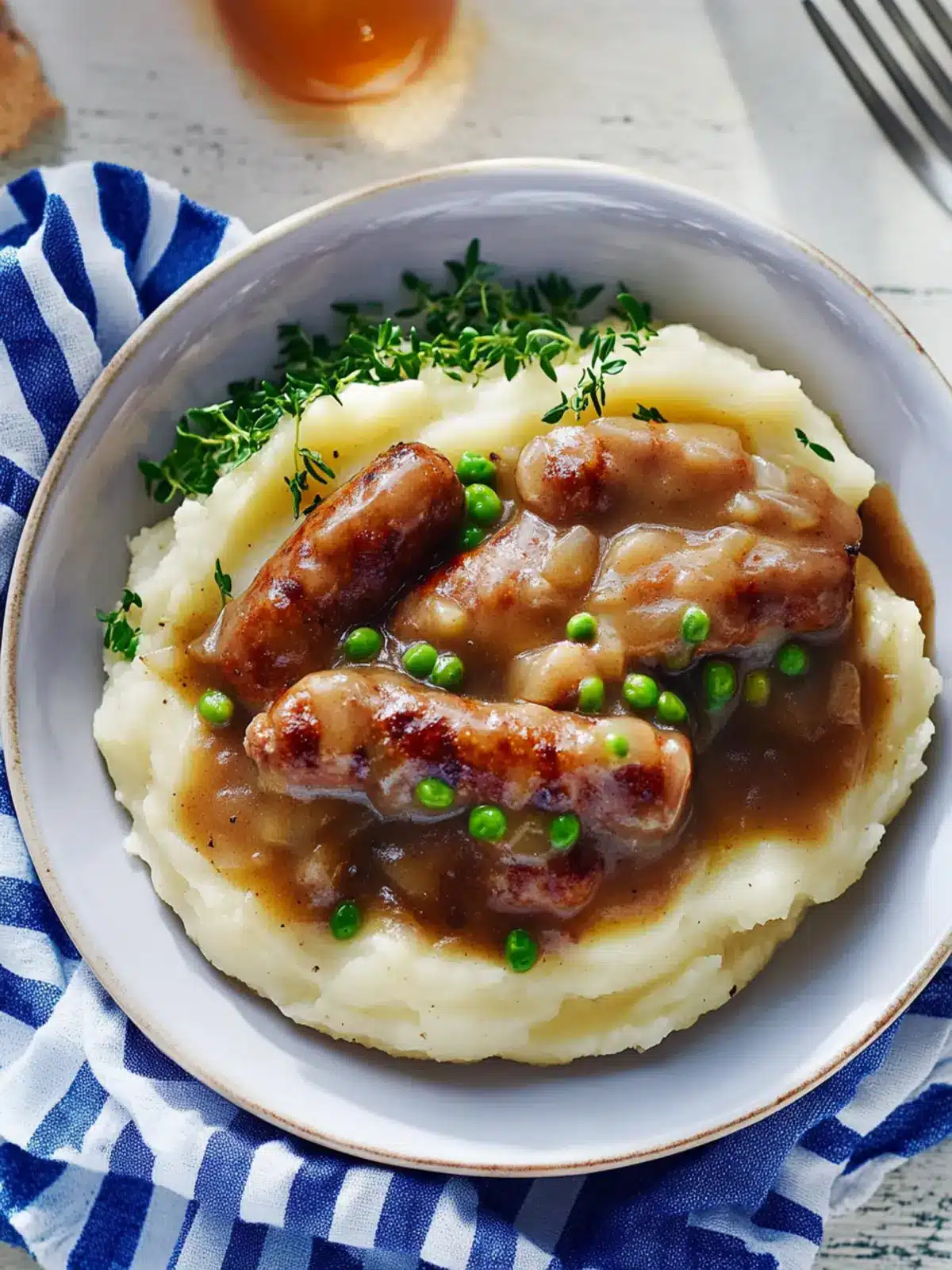 Cheesy Buttery Potato Mash with Sausage in Comforting Gravy 3 Cheesy Buttery Potato Mash with Sausage in Onion Gravy